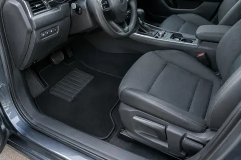 Jeu de quatre tapis noirs en velours pour habitacle, avec bordure antidérapante et talonnette en caoutchouc